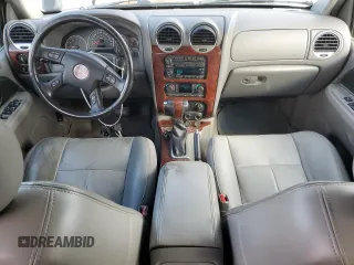 2005 GMC Envoy SLT with VIN 1GKET16M656181157, listed as a Copart auction lot 72980874 with 243,975 mi miles and Salvage Title. Bid and sale history available at DreamBid. Image 8.