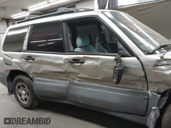 2000 Subaru Forester L with VIN JF1SF6357YH730850, listed as a IAAI auction lot 41772007 with 177,039 mi miles. Bid and sale history available at carsss.com. Image 12.