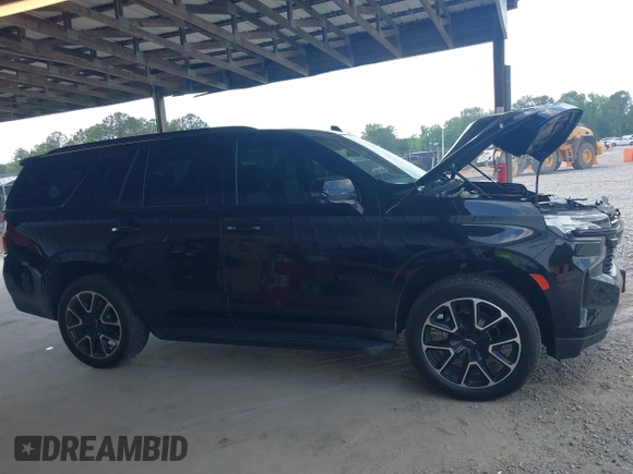 2023 Chevrolet Tahoe RST with VIN 1GNSCRKD2PR531394, listed as a IAAI auction lot 42147801 with 23,423 mi miles and . Bid and sale history available at DreamBid. Image 14.