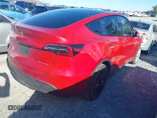 2023 Tesla Model Y Long Range with VIN 7SAYGDEE0PA202150, listed as a IAAI auction lot 41735258 with 22,131 mi miles and . Bid and sale history available at DreamBid. Image 4.