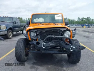 2013 Jeep Wrangler Sport z VIN 1C4AJWAG2DL538526, wystawiony jako IAAI lot #42378501 z przebiegiem 81 709 mil mil oraz . Historia ofert i sprzedaży dostępna na DreamBid. Obrazek 13.