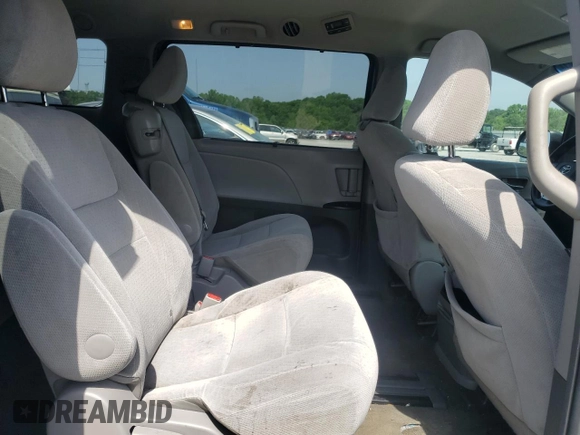 2015 Toyota Sienna LE AAS with VIN 5TDKK3DC9FS609084, listed as a Copart auction lot 57055295 with 247,531 mi miles and Salvage title. Bid and sale history available at DreamBid. Image 11.