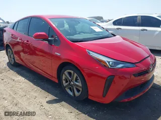 2021 Toyota Prius L Eco with VIN JTDKAMFU3M3138708, listed as a IAAI auction lot 42006401 with 38,876 mi miles. Bid and sale history available at carsss.com. Image 1.
