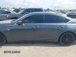2021 Cadillac CT5 Premium Luxury z VIN 1G6DN5RK9M0111997, wystawiony jako IAAI lot #42715545 z przebiegiem 78 769 mil mil oraz . Historia ofert i sprzedaży dostępna na DreamBid. Obrazek 14.