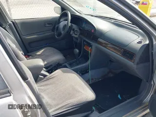 1995 Nissan Altima XE with VIN 1N4BU31D5SC101493, listed as a IAAI auction lot 41913245 with 224,199 mi miles. Bid and sale history available at carsss.com. Image 5.
