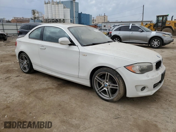 2012 BMW 1 Series 128i with VIN WBAUP7C55CVM54987, listed as a Copart auction lot 76133874 with 124,958 mi miles and Salvage title. Bid and sale history available at DreamBid. Image 4.
