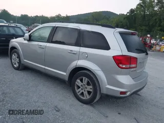 2012 Dodge Journey SXT with VIN 3C4PDCBBXCT323532, listed as a IAAI auction lot 42471610 with 188,103 mi miles and . Bid and sale history available at DreamBid. Image 3.