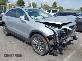 2020 Cadillac XT4 FWD Sport with VIN 1GYFZER46LF122716, listed as a IAAI auction lot 41905824 with 51,986 mi miles and . Bid and sale history available at carsss.com. Image 1.