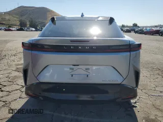2024 Lexus RZ 300e Premium z VIN JTJABABB6RA002164, wystawiony jako Copart lot #56575245 z przebiegiem 11 687 mil mil oraz Szkoda całkowita • Salvage title. Historia ofert i sprzedaży dostępna na DreamBid. Obrazek 6.