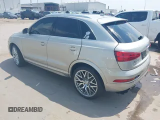 2016 Audi Q3 Premium Plus z VIN WA1EFCFS3GR002758, wystawiony jako IAAI lot #42262429 z przebiegiem 134 850 mil mil oraz . Historia ofert i sprzedaży dostępna na DreamBid. Obrazek 3.