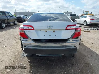 2014 Toyota Camry L with VIN 4T4BF1FK0ER384563, listed as a IAAI auction lot 41782381 with 75,868 mi miles. Bid and sale history available at carsss.com. Image 6.