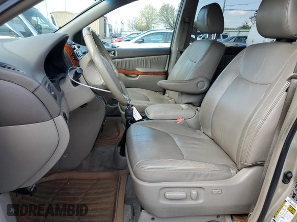 2010 Toyota Sienna XLE with VIN 5TDYK4CCXAS330463, listed as a Copart auction lot 52581315 with 226,668 mi miles and Salvage Title. Bid and sale history available at carsss.com. Image 7.