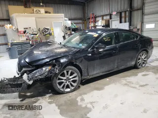 2016 Mazda 6 i Grand Touring with VIN JM1GJ1W5XG1415657, listed as a Copart auction lot 44359195 with Not Provided miles and Salvage Title. Bid and sale history available at DreamBid. Image 1.