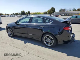 2020 Ford Fusion Titanium z VIN 3FA6P0RU3LR231920, wystawiony jako Copart lot #61643035 z przebiegiem 55 855 mil mil oraz Szkoda całkowita • Salvage title. Historia ofert i sprzedaży dostępna na DreamBid. Obrazek 2.