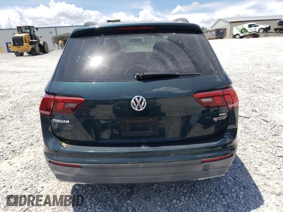 2018 Volkswagen Tiguan S with VIN 3VV0B7AX4JM042248, listed as a Copart auction lot 65202625 with 102,021 mi miles and Salvage title. Bid and sale history available at DreamBid. Image 6.