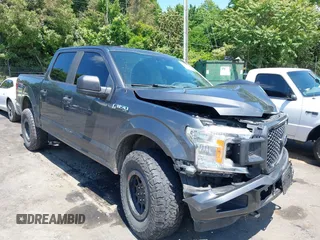 2019 Ford F-150 XL with VIN 1FTEW1EP7KFC28853, listed as a IAAI auction lot 42176182 with 132,599 mi miles and . Bid and sale history available at DreamBid. Image 1.