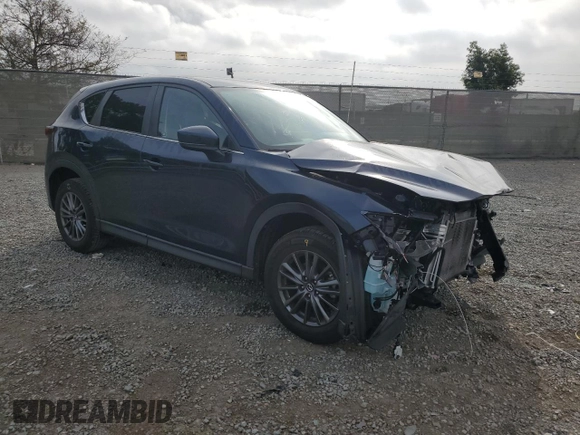 2021 Mazda CX-5 Touring with VIN JM3KFACM1M0313910, listed as a Copart auction lot 47834815 with 40,671 mi miles and Salvage Title. Bid and sale history available at carsss.com. Image 4.