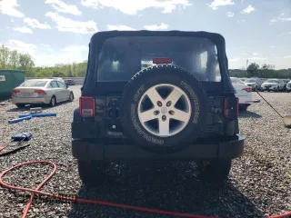 2013 Jeep Wrangler Sport with VIN 1C4AJWAG5DL694110, listed as a Copart auction lot 52200885 with 187,924 mi miles and Salvage Title. Bid and sale history available at carsss.com. Image 6.