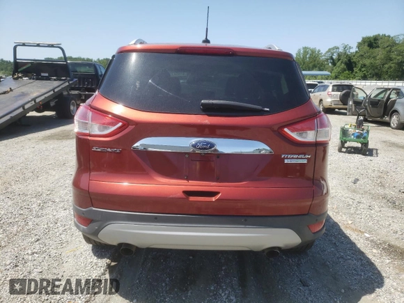 2015 Ford Escape Titanium z VIN 1FMCU0J93FUA66179, wystawiony jako Copart lot #61956325 z przebiegiem 82 889 mil mil oraz Szkoda całkowita • Salvage title. Historia ofert i sprzedaży dostępna na DreamBid. Obrazek 6.