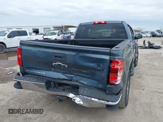 2014 Chevrolet Silverado 1500 LT with VIN 1GCRCREH4EZ296256, listed as a IAAI auction lot 41149836 with 116,955 mi miles and . Bid and sale history available at DreamBid. Image 16.