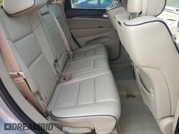 2016 Jeep Grand Cherokee Overland with VIN 1C4RJFCT2GC320247, listed as a Copart auction lot 50832195 with 104,300 mi miles and Salvage title. Bid and sale history available at DreamBid. Image 11.