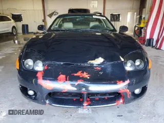 1998 Mitsubishi 3000GT GT z VIN JA3AM84J6WY003097, wystawiony jako Copart lot #83553054 z przebiegiem 270 417 mil mil oraz Szkoda całkowita • Salvage title. Historia ofert i sprzedaży dostępna na DreamBid. Obrazek 5.