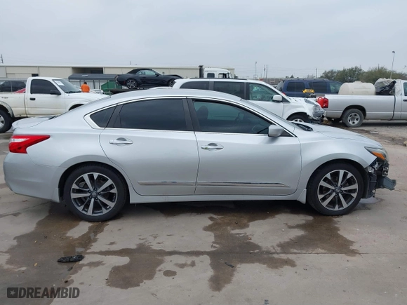 2016 Nissan Altima 2.5 SL with VIN 1N4AL3APXGC176545, listed as a IAAI auction lot 41780585 with 119,805 mi miles. Bid and sale history available at carsss.com. Image 14.