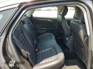 2016 Ford Fusion SE Hybrid with VIN 3FA6P0LU9GR166408, listed as a Copart auction lot 59931995 with 104,560 mi miles and Salvage title. Bid and sale history available at DreamBid. Image 10.