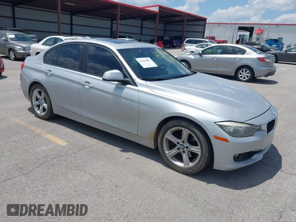 2013 BMW 3 Series 328i with VIN WBA3C1G5XDNR45054, listed as a IAAI auction lot 42504007 with 152,705 mi miles and . Bid and sale history available at DreamBid. Image 1.