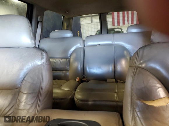 1997 GMC Yukon with VIN 1GKEC13R2VJ734299, listed as a Copart auction lot 74988224 with 225,335 mi miles and Salvage Title. Bid and sale history available at carsss.com. Image 10.