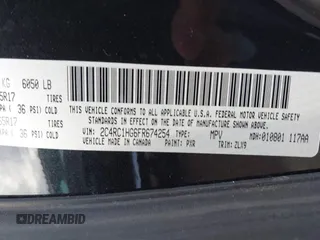 2015 Chrysler Town & Country S with VIN 2C4RC1HG6FR674254, listed as a IAAI auction lot 41199889 with 132,598 mi miles and . Bid and sale history available at DreamBid. Image 9.