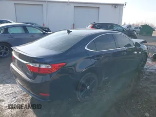 2014 Lexus ES 300h with VIN JTHBW1GG7E2071500, listed as a IAAI auction lot 41676321 with 64,217 mi miles and . Bid and sale history available at DreamBid. Image 4.