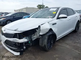 2016 Kia Optima SXL Turbo with VIN 5XXGV4L2XGG093431, listed as a IAAI auction lot 41460826 with 154,154 mi miles. Bid and sale history available at carsss.com. Image 6.