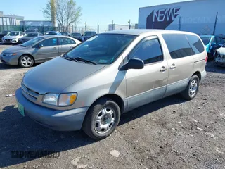 2000 Toyota Sienna CE with VIN 4T3ZF19C1YU240674, listed as a IAAI auction lot 41934876 with 250,196 mi miles. Bid and sale history available at carsss.com. Image 18.