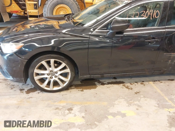 2015 Mazda 6 i Touring with VIN JM1GJ1V6XF1163952, listed as a IAAI auction lot 42230410 with 148,177 mi miles and . Bid and sale history available at carsss.com. Image 17.