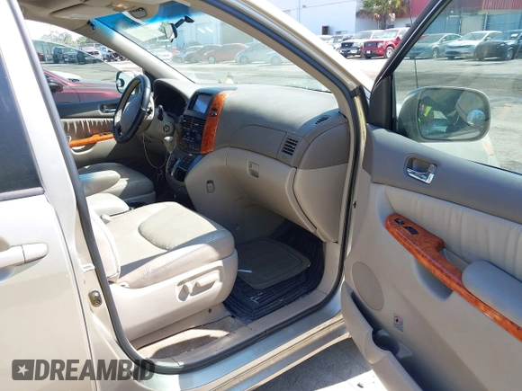 2010 Toyota Sienna XLE with VIN 5TDYK4CC5AS292110, listed as a IAAI auction lot 42055505 with 107,390 mi miles. Bid and sale history available at carsss.com. Image 5.
