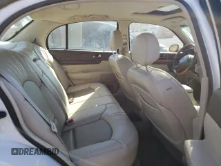 2002 Lincoln Continental with VIN 1LNHM97V62Y643532, listed as a Copart auction lot 76015984 with 154,374 mi miles and Salvage Title. Bid and sale history available at carsss.com. Image 10.