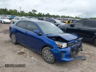 2020 Kia Rio LX with VIN 3KPA24AD0LE284555, listed as a IAAI auction lot 40515826 with 113,296 mi miles. Bid and sale history available at carsss.com. Image 1.