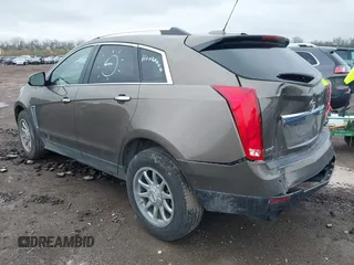 2015 Cadillac SRX Luxury Collection with VIN 3GYFNBE34FS521518, listed as a IAAI auction lot 41893073 with 82,700 mi miles and . Bid and sale history available at carsss.com. Image 3.