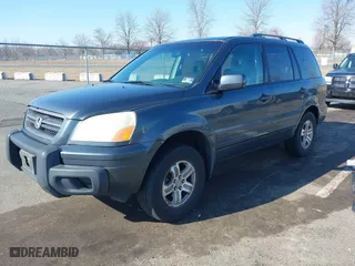 2003 Honda Pilot EX with VIN 2HKYF18503H610799, listed as a IAAI auction lot 41528867 with 323,810 mi miles. Bid and sale history available at carsss.com. Image 17.