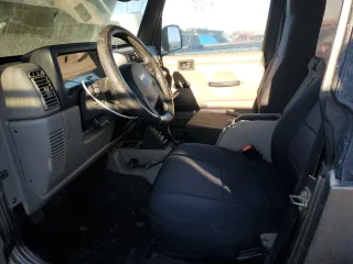 2004 Jeep Wrangler Rubicon with VIN 1J4FA69S94P778836, listed as a Copart auction lot 82884304 with 168,045 mi miles and Salvage Title. Bid and sale history available at carsss.com. Image 7.