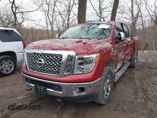 2017 Nissan Titan XD PRO-4X with VIN 1N6BA1F41HN570333, listed as a IAAI auction lot 41741250 with 62,948 mi miles. Bid and sale history available at carsss.com. Image 2.