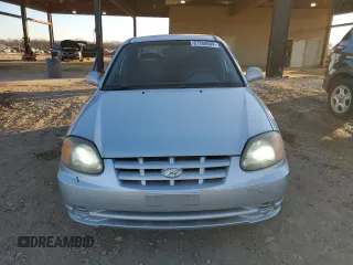 2003 Hyundai Accent GL with VIN KMHCG45C93U496038, listed as a Copart auction lot 87260904 with 104,251 mi miles and Salvage Title. Bid and sale history available at carsss.com. Image 5.