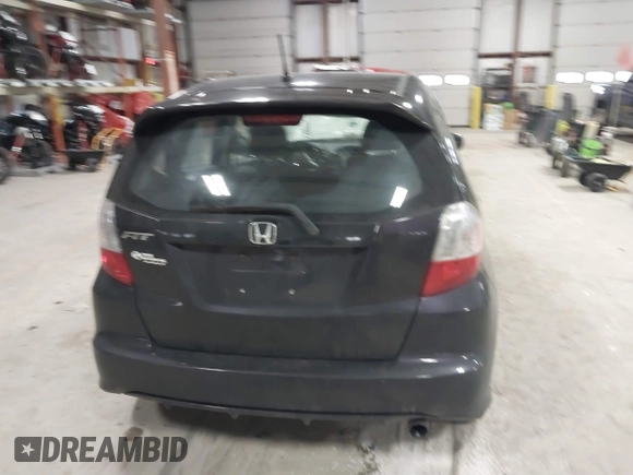 2013 Honda Fit Sport z VIN JHMGE8H56DC019556, wystawiony jako IAAI lot #41140755 z przebiegiem Nie podano mil oraz . Historia ofert i sprzedaży dostępna na DreamBid. Obrazek 15.