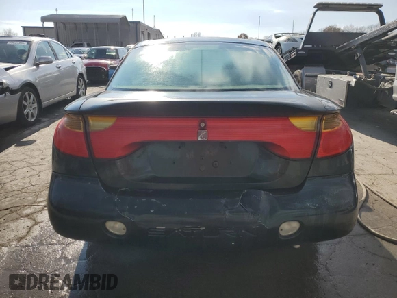 2001 Saturn SC z VIN 1G8ZR12721Z295252, wystawiony jako Copart lot #82608074 z przebiegiem 137 076 mil mil oraz Szkody całkowita. Historia ofert i sprzedaży dostępna na DreamBid. Obrazek 6.