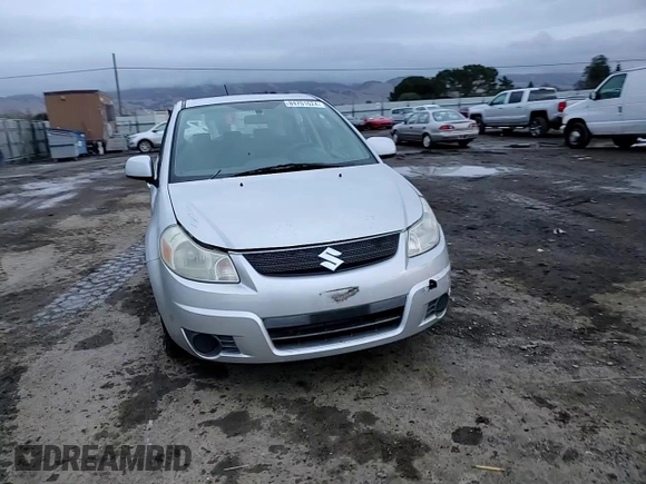 2007 Suzuki SX4 with VIN JS2YA411775100842, listed as a Copart auction lot 84701624 with 131,717 mi miles and Salvage Title. Bid and sale history available at carsss.com. Image 10.