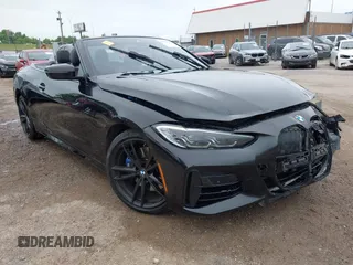 2021 BMW 4 Series M440i with VIN WBA53AT0XMCH23521, listed as a IAAI auction lot 42419017 with Not provided miles and . Bid and sale history available at DreamBid. Image 1.