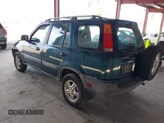 1997 Honda CR-V with VIN JHLRD1857VC046080, listed as a IAAI auction lot 41616075 with 212,707 mi miles. Bid and sale history available at carsss.com. Image 3.