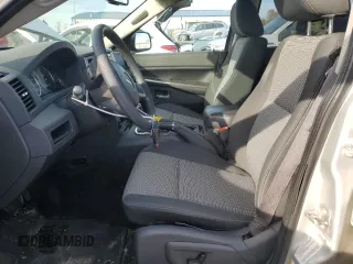 2009 Jeep Grand Cherokee Laredo with VIN 1J8HR48P89C552691, listed as a Copart auction lot 82080964 with 100,876 mi miles and Salvage Title. Bid and sale history available at carsss.com. Image 7.
