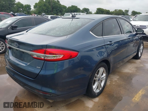 2018 Ford Fusion SE with VIN 3FA6P0H73JR109454, listed as a IAAI auction lot 42438366 with 105,802 mi miles and . Bid and sale history available at DreamBid. Image 4.